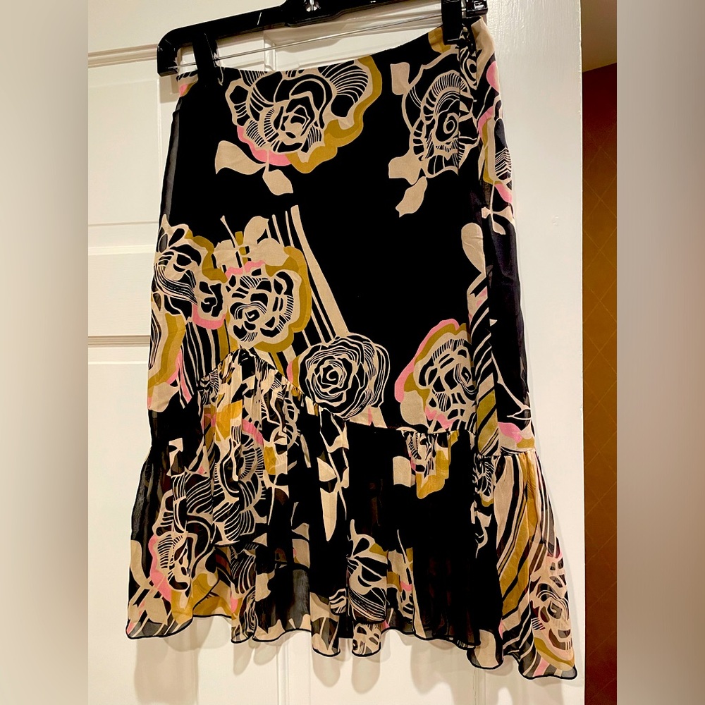 Trina turk silk skirt. Size 2 with asymmetrical hem.